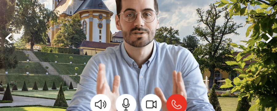 Eine Videokonferenz und im Hintergrund ist ein Wahrzeichen zu sehen.
