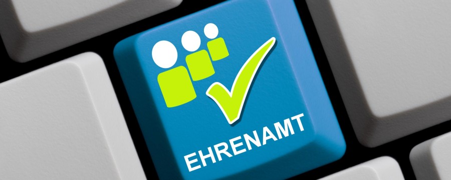 Computertaste mit Ehrenamts-Symbol