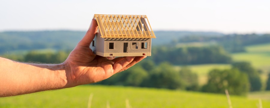 Baugrundstücke Symbolisches Bild mit Haus