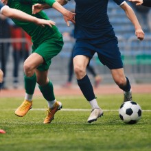 Fußballspieler auf Platz