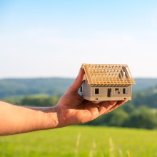 Baugrundstücke Symbolisches Bild  mit Haus