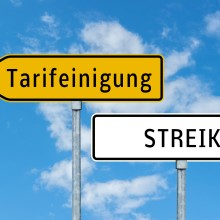 Tarifverhandlungen Öffentlicher Dienst 2025 Symbolbild: Schilder mit Tarifeinigung und Streik